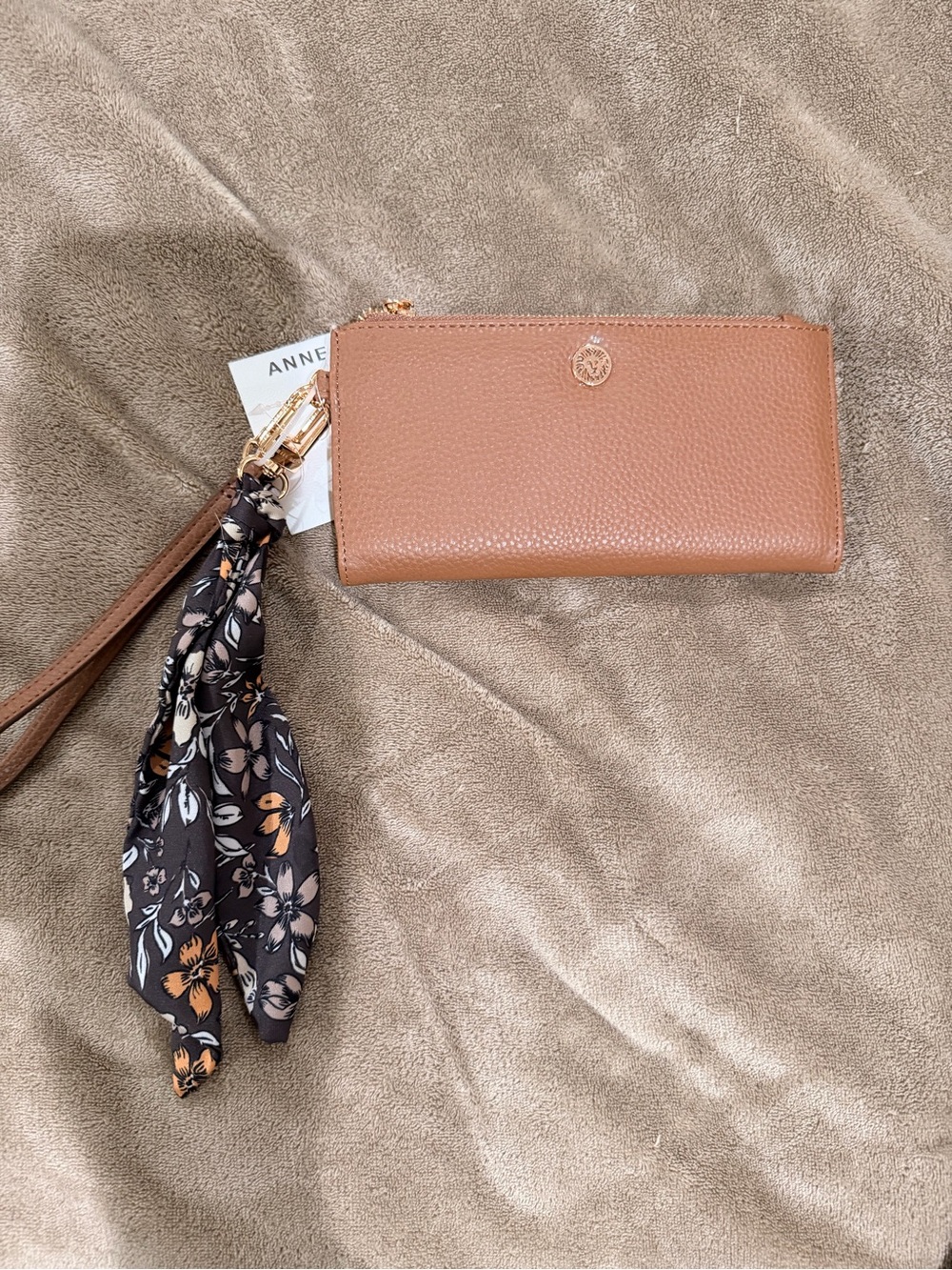 Anne Klein Cognac Pebbled Leather Wristlet with Floral Scarf Accent
